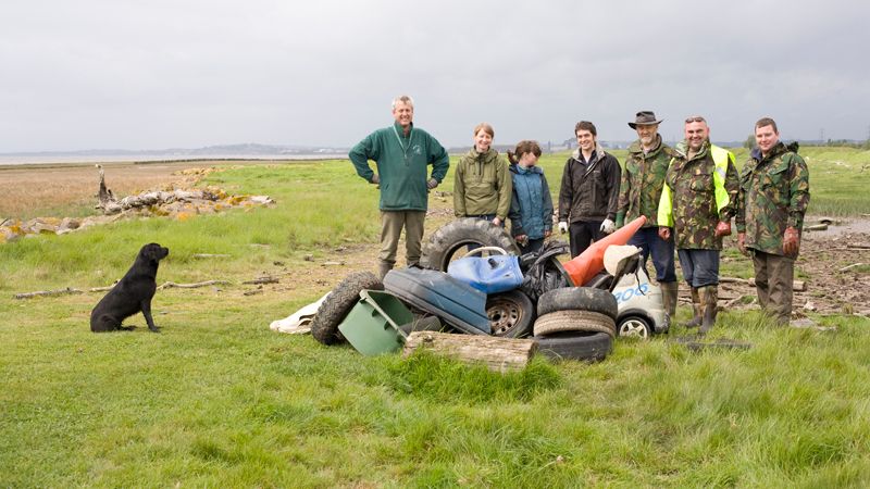 Wentloog Wildfowlers and Gwent Wildlife Trust members tidy up foreshore